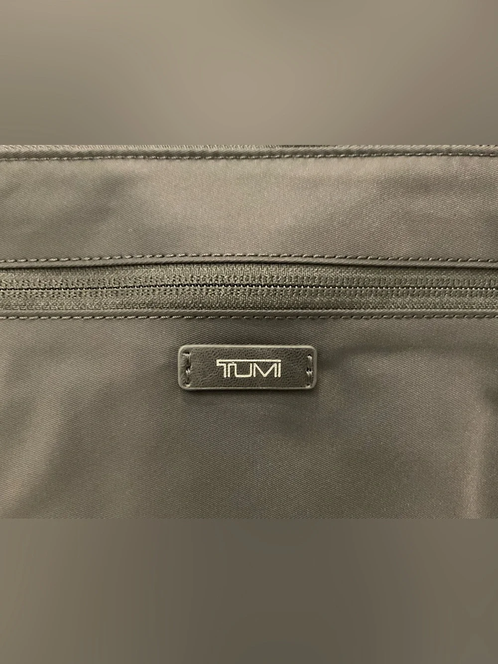 Tumi up sale